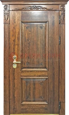 Коричневая металлическая дверь с массивом дуба и филенкой ДМД-67 в Саратове